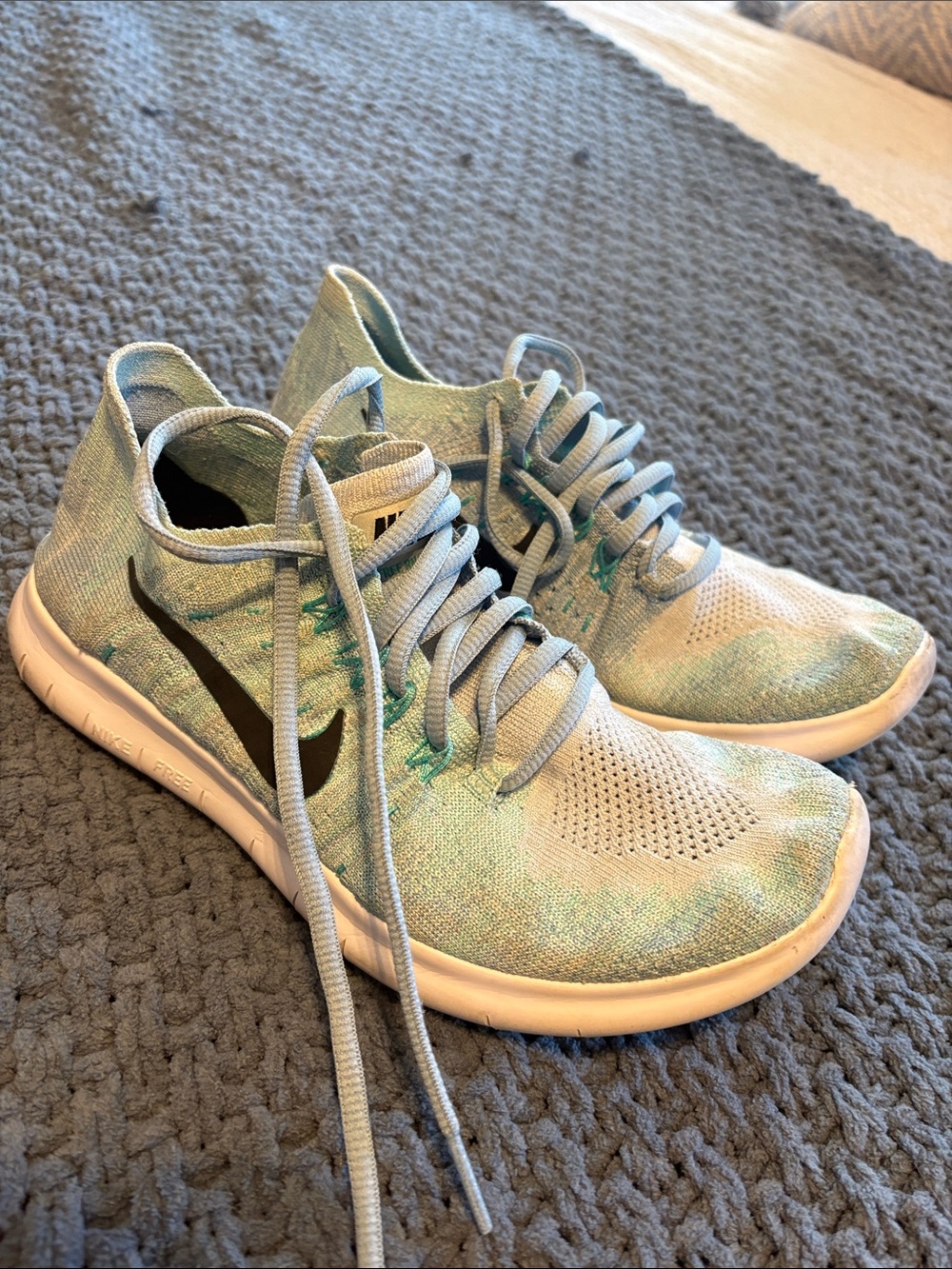 Nike Men’s Light Blue and Teal Flyknit Athletic Shoes